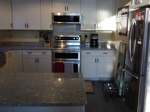 Kitchen remodel with double oven and granite counters